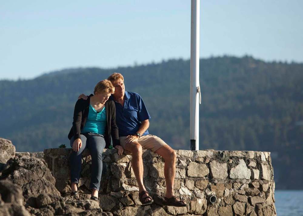 Patchell-Evans and his daughter Kilee, who is on the autism spectrum, at their oceanfront home in Victoria. Patchell-Evans has made donating to autism one of his primary philanthropic efforts.