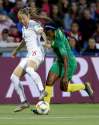 Claude Paris / The Associated Press
Canada's Janine Beckie, left, and Cameroon's Yvonne Leuko battle for the ball during the Women's World Cup Group E soccer match between Canada and Cameroon in Montpellier, France.