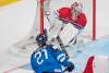 Finland's Joona Luoto scores against Czech Republic goaltender Jakub Skarek during first period preliminary round IIHF World Junior Championship hockey action in Montreal, Monday, December 26, 2016. THE CANADIAN PRESS/Graham Hughes