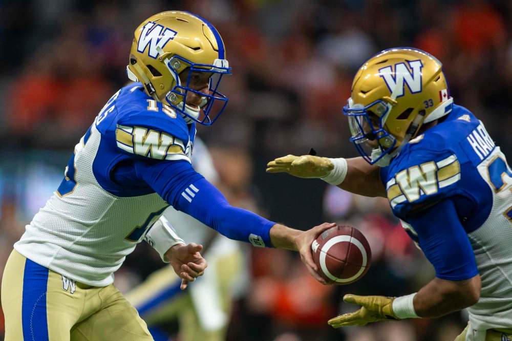 BEN NELMS / THE CANADIAN PRESS
Winnipeg Blue Bombers quarterback Matt Nichols (left) and running back Andrew Harris were both on top of their games against the B.C. Lions in Vancouver on Saturday.