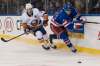 Mary Altaffer / The Associated Press files
In January, New York Rangers defenseman Neal Pionk (44) and New York Islanders right wing Cal Clutterbuck (15) chase the puck during the first period of an NHL hockey game in New York.