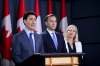 THE CANADIAN PRESS/Sean Kilpatrick
Prime Minister Justin Trudeau announces his government's approval of the Trans Mountain Expansion Project in Ottawa on Tuesday – just one day after Minister of Environment and Climate Change Catherine McKenna, far right, put forward a resolution to declare a national climate emergency.