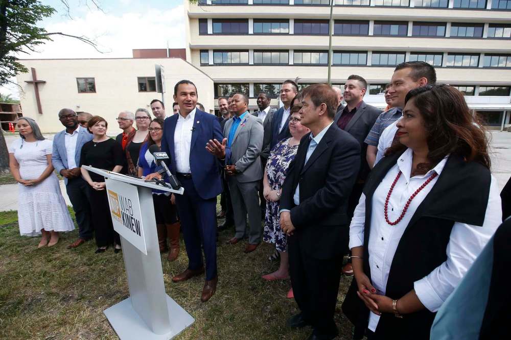 JOHN WOODS / WINNIPEG FREE PRESSManitoba NDP Leader Wab Kinew and party candidates highlight health care at a pre-election news conference in front of the Misericordia Health Centre in Winnipeg Sunday.