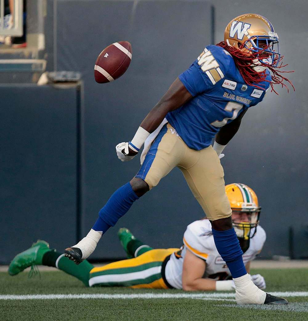 PHIL HOSSACK / WINNIPEG FREE PRESS - Winnipeg Blue Bomber #7 Lucky Whitehead celebrates scoring the team's 2nd touchdown Thursday night against the Edmonton Eskimos.