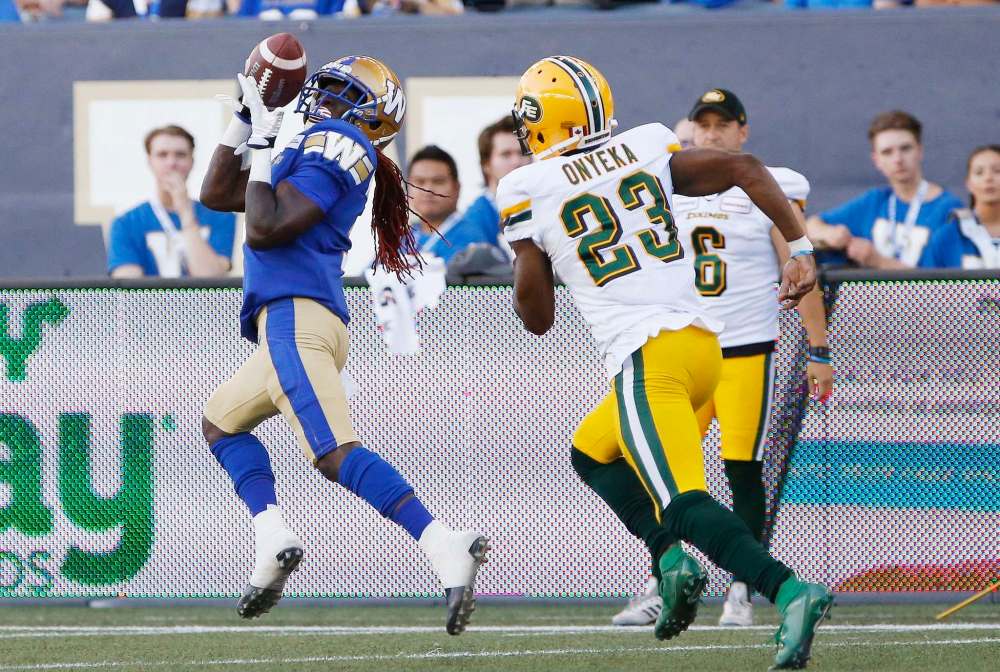 THE CANADIAN PRESS/John Woods
Winnipeg Blue Bombers' Lucky Whitehead makes on of his two touchdown catches last Thursday against the Edmonton Eskimos.