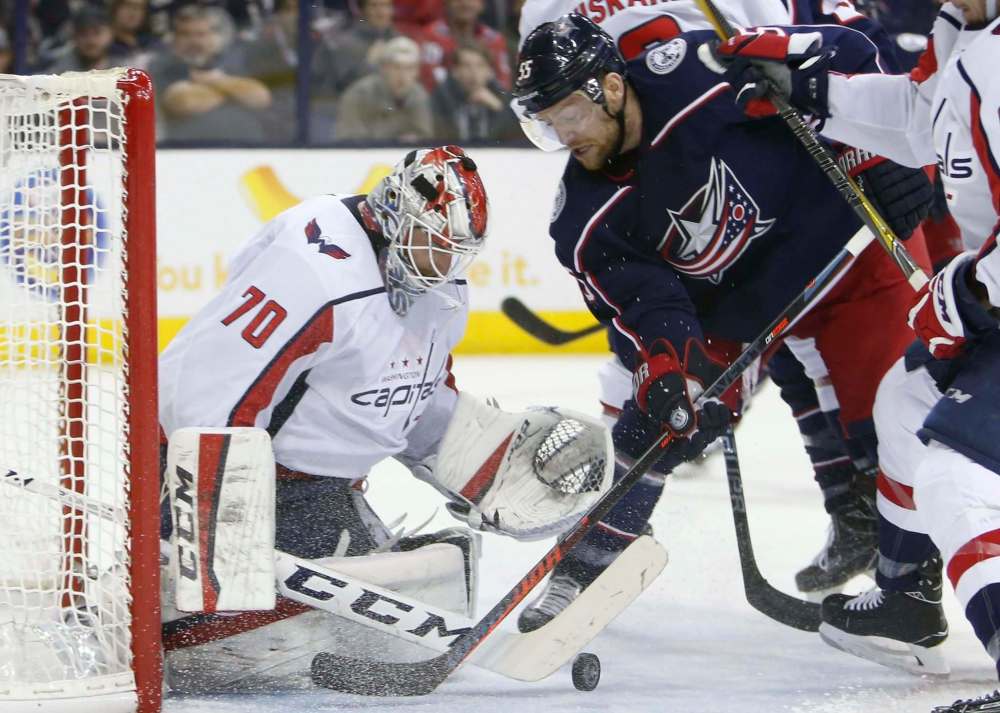 Jay LaPrete / The Associated Press files
The Columbus Blue Jackets’ Mark Letestu fights for a puck against the Washington Capitals on April 19, 2018, in Columbus, Ohio. Letestu signed with the Winnipeg Jets on Tuesday.