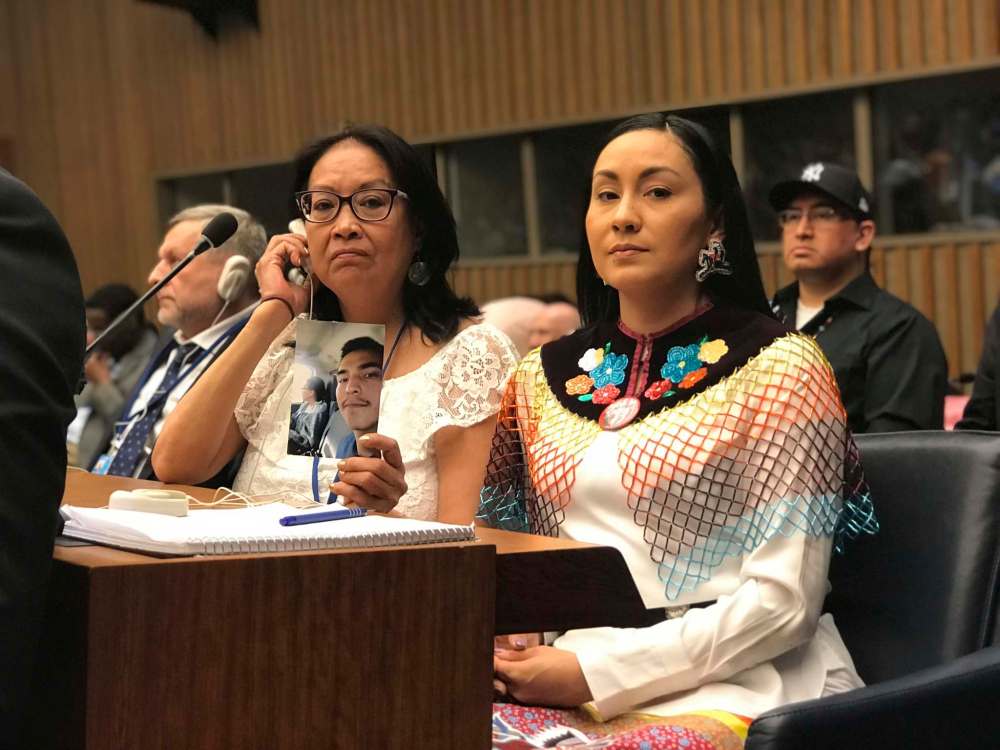 Debbie Baptiste, left, and Jade Tootoosis at the United Nations building in New York in the documentary nîpawistamâsowin: We Will Stand Up, a film about the killing of Colten Boushie, a young Indigenous man in Saskatchewan. (NFB / CBC)