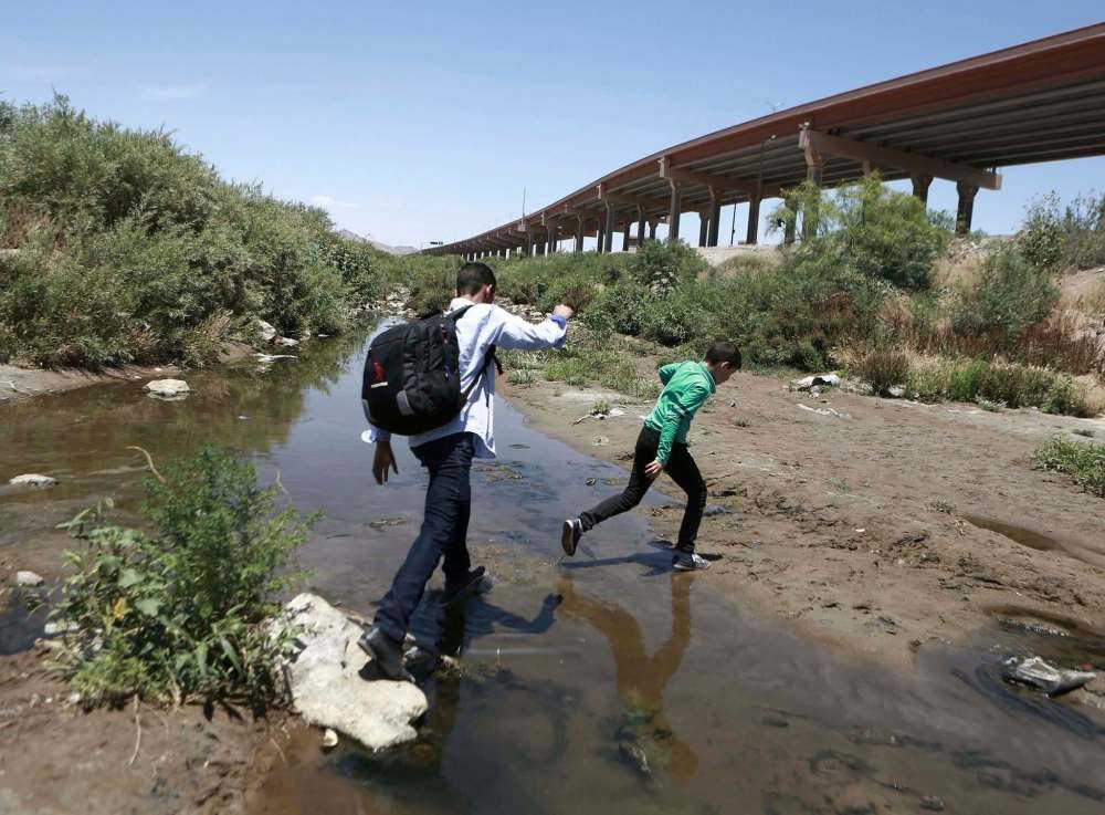 Christian Torres / The Associated Press files
Central American migrants are mostly Christians, says John Garland, pastor of the San Antonio Mennonite Church in Texas.