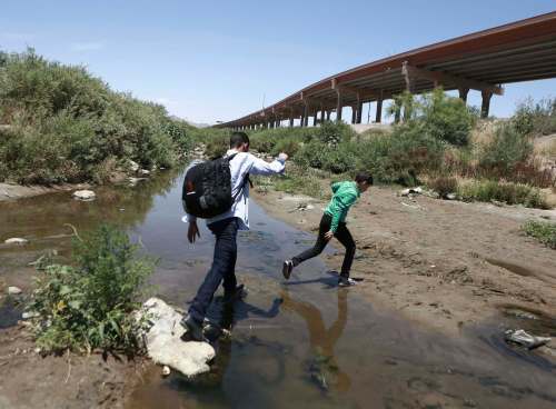 Christian Torres / The Associated Press files
Central American migrants are mostly Christians, says John Garland, pastor of the San Antonio Mennonite Church in Texas.