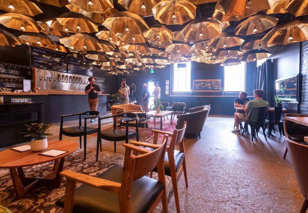 SASHA SEFTER / WINNIPEG FREE PRESS
The taproom of Nonsuch Brewing Co. looks cool but feels warm, with a mix of seating and a quiet little nook at the back.