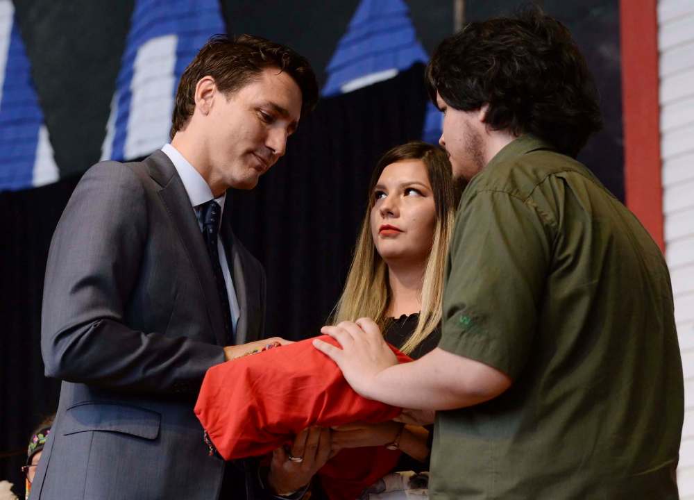 Adrian Wyld / The Canadian Press Files
Indigenous youth present the final report to Prime Minister Justin Trudeau at the closing ceremony for the National Inquiry into Missing and Murdered Indigenous Women and Girls in Gatineau, Que., on June 3.