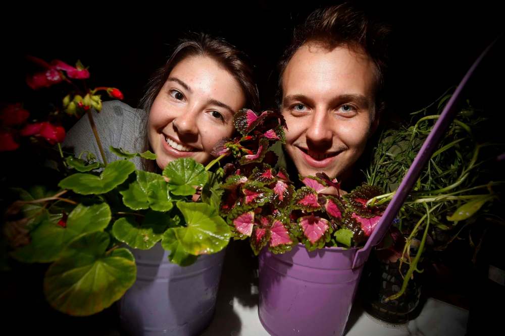 JOHN WOODS / WINNIPEG FREE PRESS
Bethany Daman and Sasha Schellenberg display some of the plants and flowers they are growing that will be used at their green wedding.