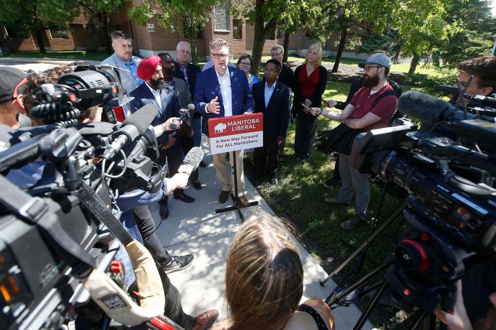 JOHN WOODS / WINNIPEG FREE PRESS Manitoba Liberal party leader Dougald Lamont speaks to media and a handful of supporters about some of the party’s health care policies outside Seven Oaks Hospital in Winnipeg Sunday, July 14, 2019. Reporter: Israel