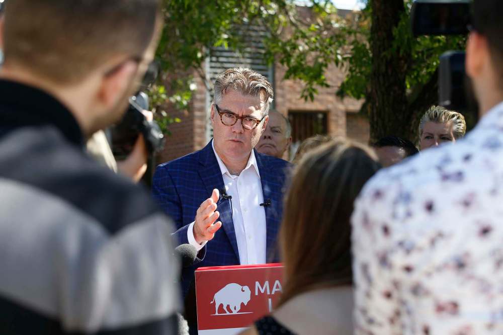JOHN WOODS / WINNIPEG FREE PRESS Manitoba Liberal party leader Dougald Lamont speaks to media and a handful of supporters about some of the party’s health care policies outside Seven Oaks Hospital in Winnipeg Sunday, July 14, 2019. Reporter: Israel