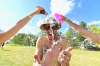 MIKE SUDOMA / WINNIPEG FREE PRESS
Andrew Beerman gets doused in ice water on Sunday under sunny skies at the Winnipeg Folk Festival at Birds Hill Park.