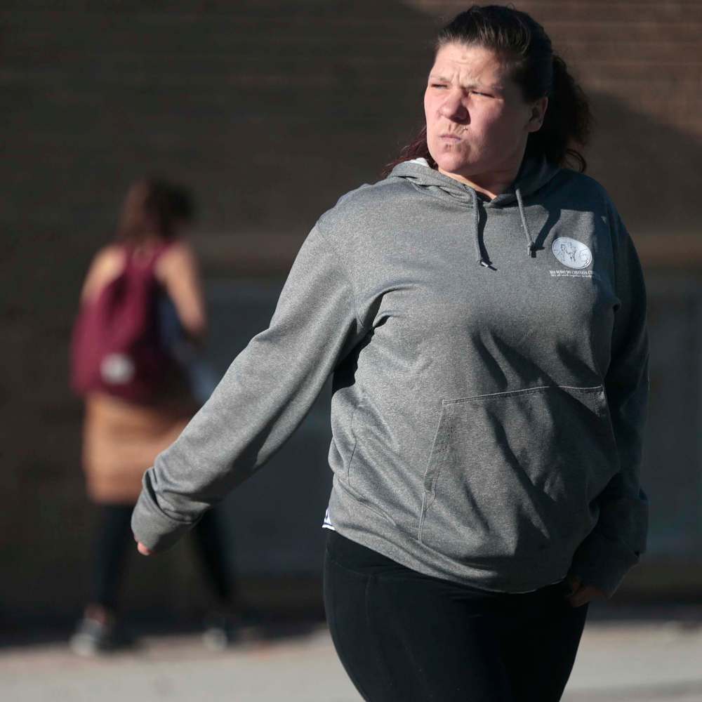 PHIL HOSSACK / WINNIPEG FREE PRESS
Frustration and concern register on Blaydon’s face after her offer of care and help were refused by a young woman found sheltering in doorway on Ellice Avenue after exiting a notorious Furby Street apartment building.