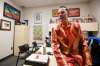Chase, decked out in a polyester bacon suit at his Shaw Park office, brings the sizzle to Goldeyes’ promotions. (John Woods / Winnipeg Free Press)