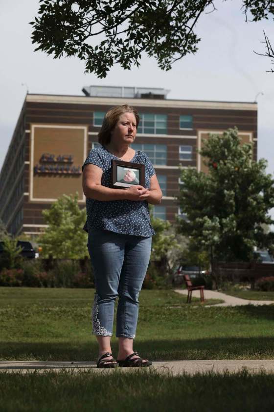 RUTH BONNEVILLE / WINNIPEG FREE PRESSColleen Bytheway holds a picture of her late father, Jack Stewart, outside the Grace Hospital on Wednesday. Stewart died Oct. 12, 2018.