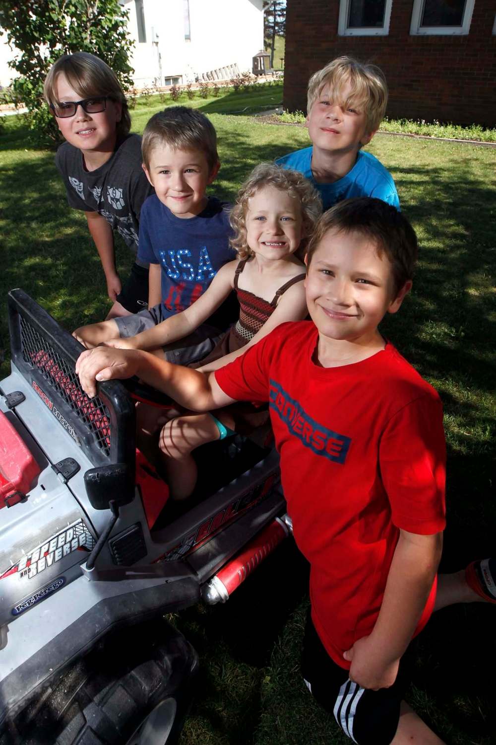 PHIL HOSSACK / WINNIPEG FREE PRESS
Siblings Matthias (11) (front row, left to right), Timothy (7), Zélie (5), Tobias (10) and John Jacob Smook (back) all attended or will attend camp this summer courtesy of the Winnipeg Free Press Sunshine Fund.