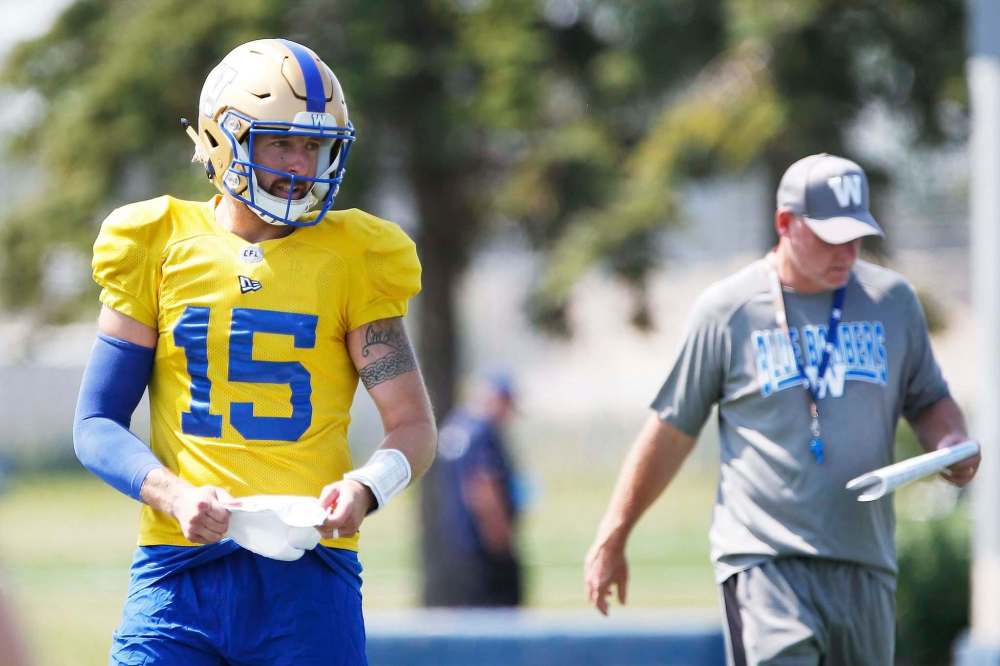 JOHN WOODS / WINNIPEG FREE PRESS files
Blue Bombers offensive co-ordinator Paul LaPolice (right), seen with quarterback Matt Nichols at practice on Sunday, said his own performance on Thursday was ‘terrible.’