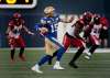 PHIL HOSSACK / WINNIPEG FREE PRESS
Winnipeg Blue Bombers QB Matt Nichols winds up to pass against the Stampeders Thursday night at IG Field.