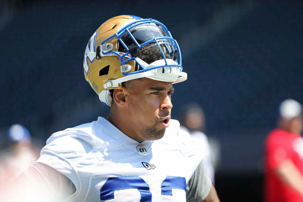 RUTH BONNEVILLE / WINNIPEG FREE PRESS FILES
Winnipeg Blue Bombers running back Andrew Harris appeared to have injured his right arm in practice, Tuesday.