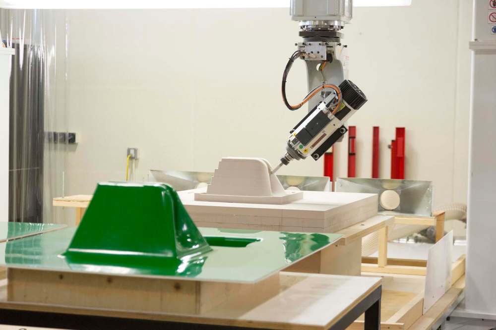 SUPPLIED
The five-axis machining centre with a tool in the foreground and the structure being machined in the background.
