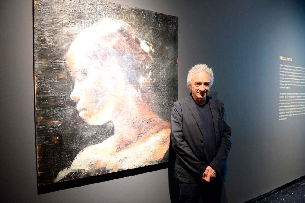 Eric Au photo
Artist Tony Scherman in front of his work Walk On, No Lines, from the About 1865 series.