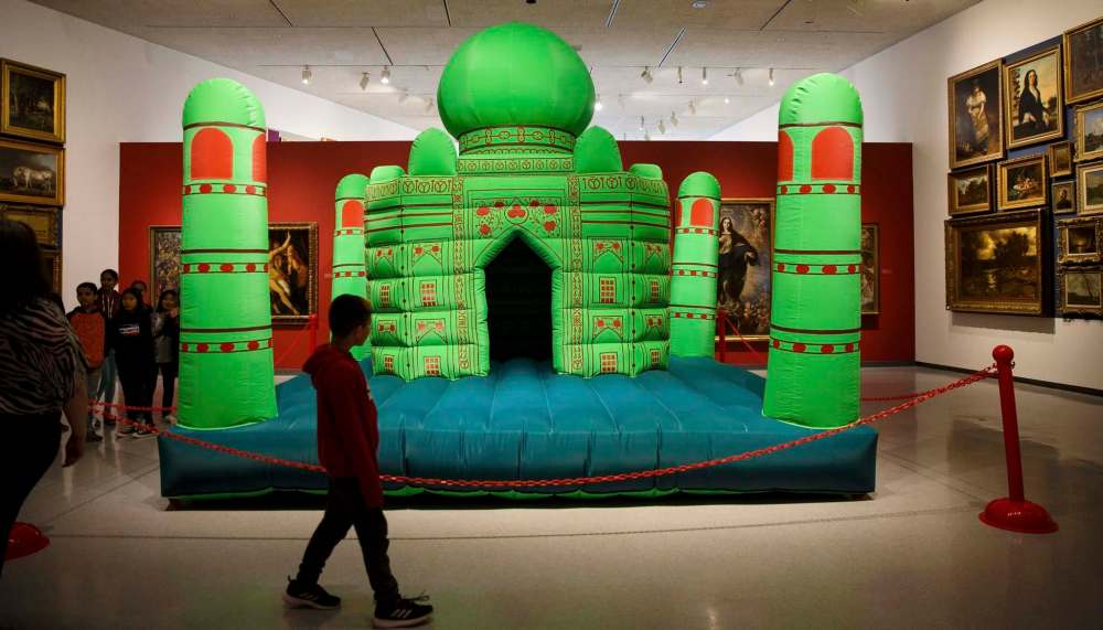 MIKE DEAL / WINNIPEG FREE PRESSStudents from OV Jewitt Community School walk past Divya Mehra’s inflatable attempt at the Taj Mahal.WAG held a preview of the Vision Exchange: Perspectives from India to Canada Thursday morning for Grade 4 students from OV Jewitt Community School and the media. According to the WAG it is Manitoba’s first major exhibition celebrating contemporary artists from India and Canada. Dr. Stephen Borys, WAG Director and CEO spoke during the event that was also attended by artist Sarindar Dhaliwal whose work, “the cartographer’s mistake: the Radcliffe Line, 2012” is on display.190509 - Thursday, May 09, 2019.