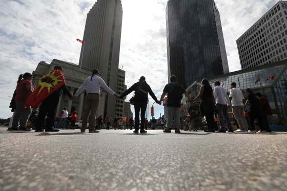 RUTH BONNEVILLE / WINNIPEG FREE PRESSGrand Chief Jerry Daniels of the Southern Chiefs Organization and supporters gathered for a rally and unity dance at Portage and Main to call attention to Indigenous rights on Wednesday.