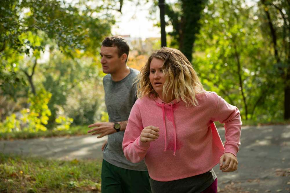 Anna Kooris / Amazon Studios
Jillian Bell (right) gets in shape with Micah Stock in Brittany Runs a Marathon.