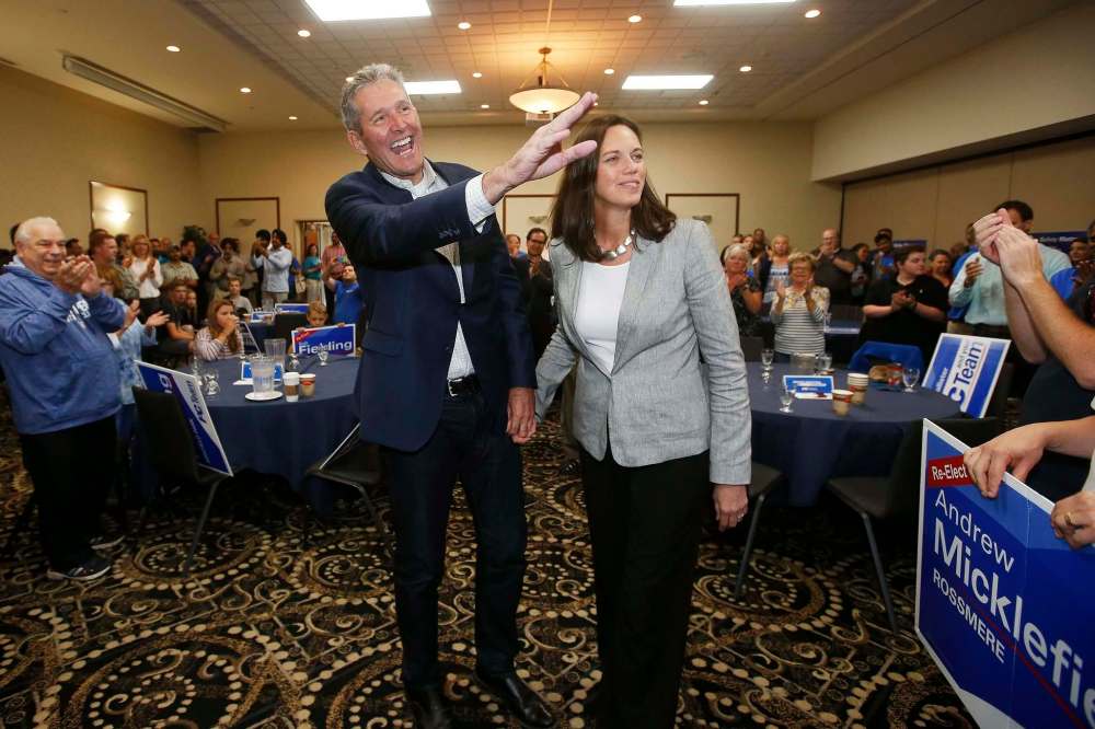 Progressive Conservative Leader Brian Pallister and his wife, Esther, enter a rally at a Winnipeg hotel Sunday. (John Woods / Winnipeg Free Press)