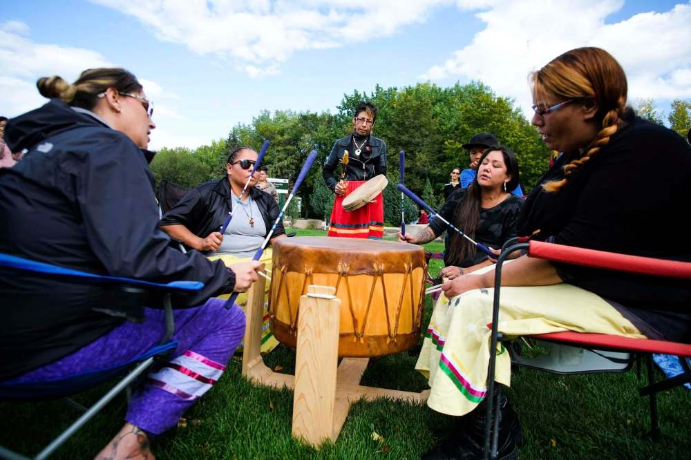 Songs and drums are played in memory of Tanya Nepinak, and all missing and murdered Indigenous women and girls. (Daniel Crump / Winnipeg Free Press)