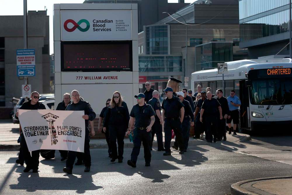 PHIL HOSSACK / WINNIPEG FREE PRESS
Dozens of Stony Mountain Institution Guards showed up Monday at Canadian Blood Services to offer a mass donation and to highlight issues affecting federal prison guards in Canada ahead of the upcoming election.