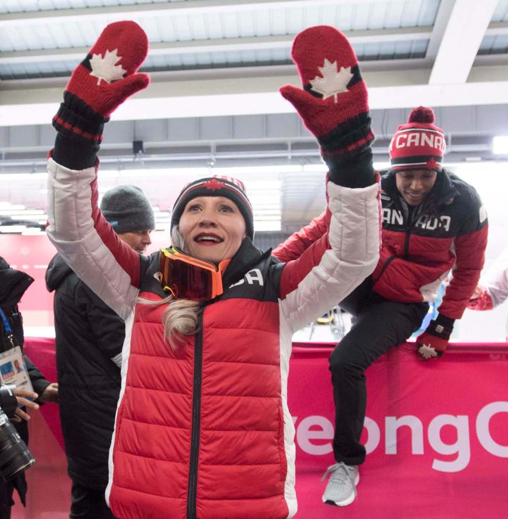 Jonathan Hayward / The Canadian Press files
Kaillie Humphries celebrates her bronze medal in 2018.