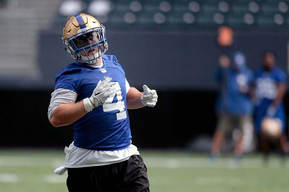 Phil Hossack / Winnipeg Free Press
Bighill practises with the Bombers on Tuesday, no worse for wear for having his hat swung at him.