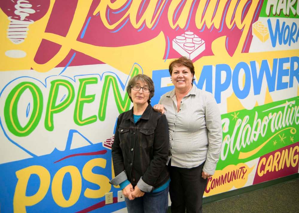 MIKE SUDOMA / WINNIPEG FREE PRESS <p/>
Volunteer Armenia Evaristo (left) and executive director Karen Velthuys (right) at the Learning Disabilities Association of Manitoba.