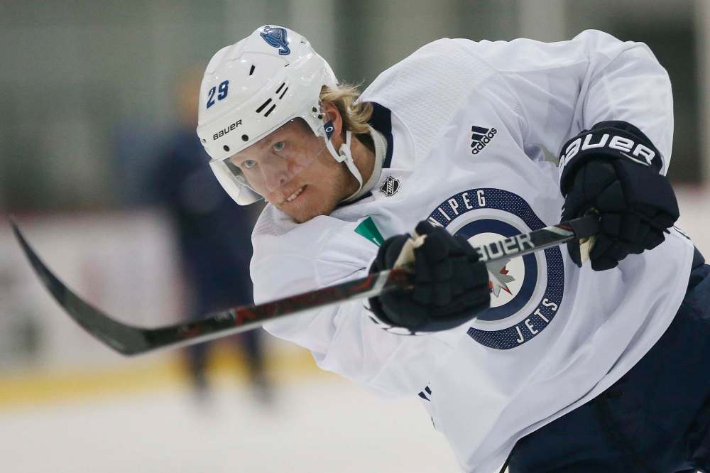 Patrik Laine inked a two-year bridge deal Friday that will pay him an average annual salary of US$6.75 million per season. (John Woods / The Canadian Press files)