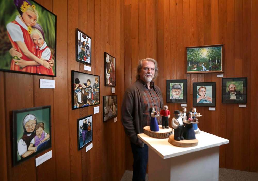 Ray Dirks is the curator of the Mennonite Heritage Centre Gallery at Canadian Mennonite University, which is hosting a pair of Hutterite art exhibits. (Ruth Bonneville photos / Winnipeg Free Press)