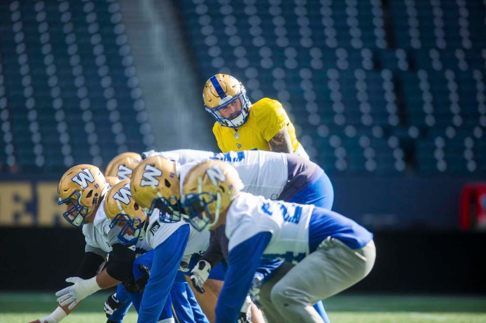 MIKAELA MACKENZIE / WINNIPEG FREE PRESS
Quarterback Chris Streveler calls a play during practice on Tuesday. If the Bombers are going to get back to winning, Streveler will most likely have to throw the ball more.