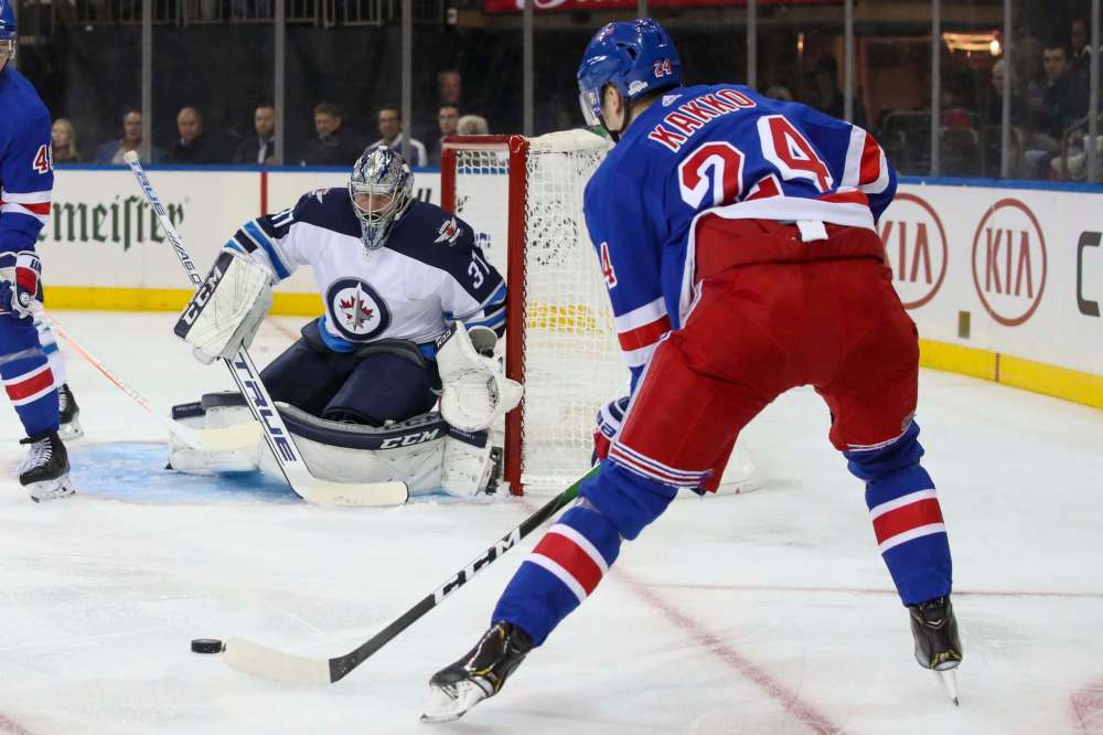 The Rangers were able to generate speed through the neutral zone, which caught the Jets flat-footed and found easy attacking lanes too often. (Mary Altaffer / The Associated Press)