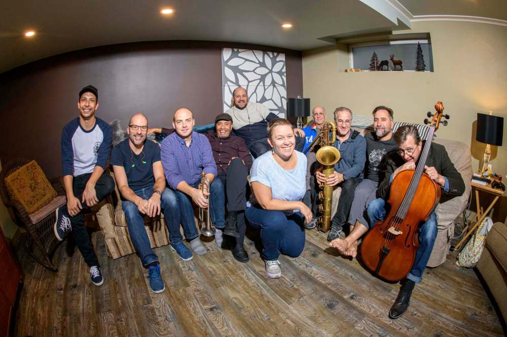 Papa Mambo take a break during practice for the band’s 30th anniversary show Friday, Oct. 11 at X-Cues Billiards and Cafe. (Mike Sudoma / Winnipeg Free Press)