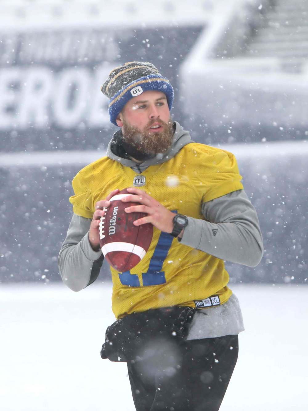 RUTH BONNEVILLE / WINNIPEG FREE PRESS
Bombers quarterback Chris Streveler practises throwing in a blizzard Friday ahead of today’s game against the Alouettes at IG Field.