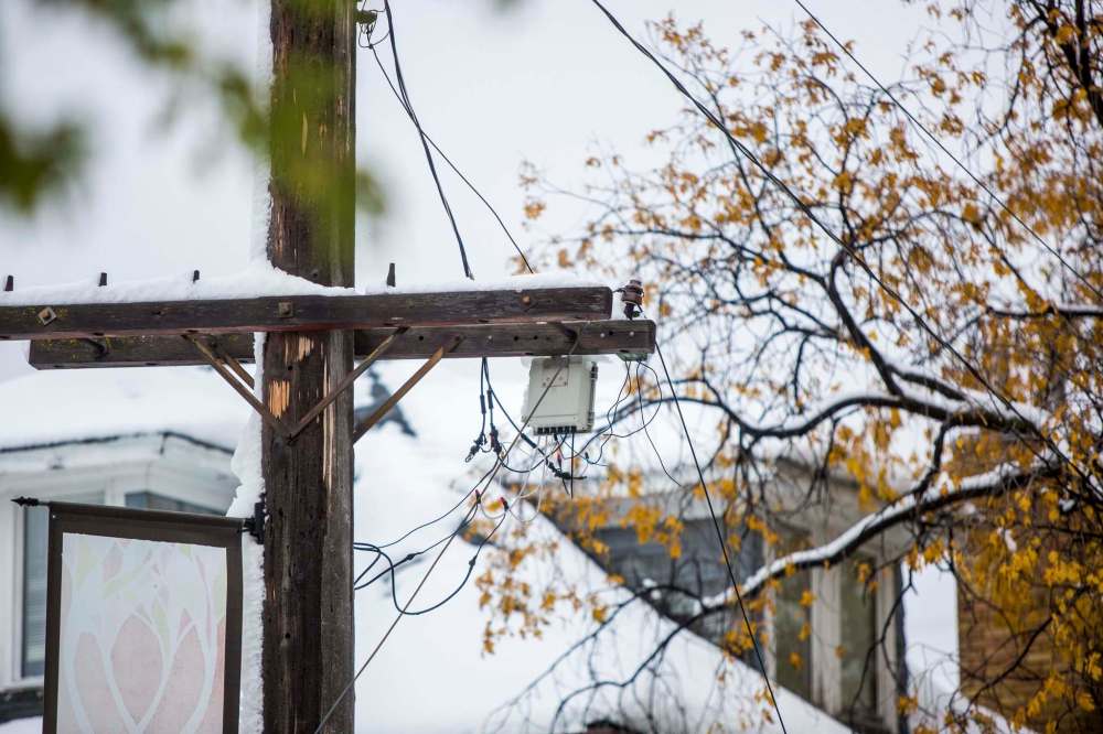 MIKAELA MACKENZIE / WINNIPEG FREE PRESS
A downed power line is taped off on Westminster Avenue at Canora Street on Saturday.