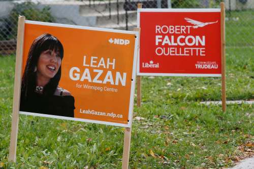 JOHN WOODS / WINNIPEG FREE PRESS
Election signs for NDP candidate Leah Gazan and Liberal candidate Robert-Falcon Ouellette in the federal riding of Winnipeg Centre.