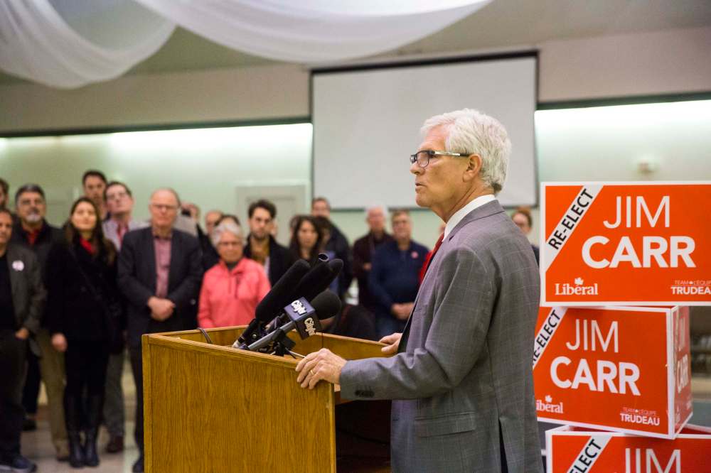 MIKAELA MACKENZIE / WINNIPEG FREE PRESS
Liberal candidate Jim Carr celebrates his win in Winnipeg South Centre with supporters at the Caboto Centre in Winnipeg on Monday.