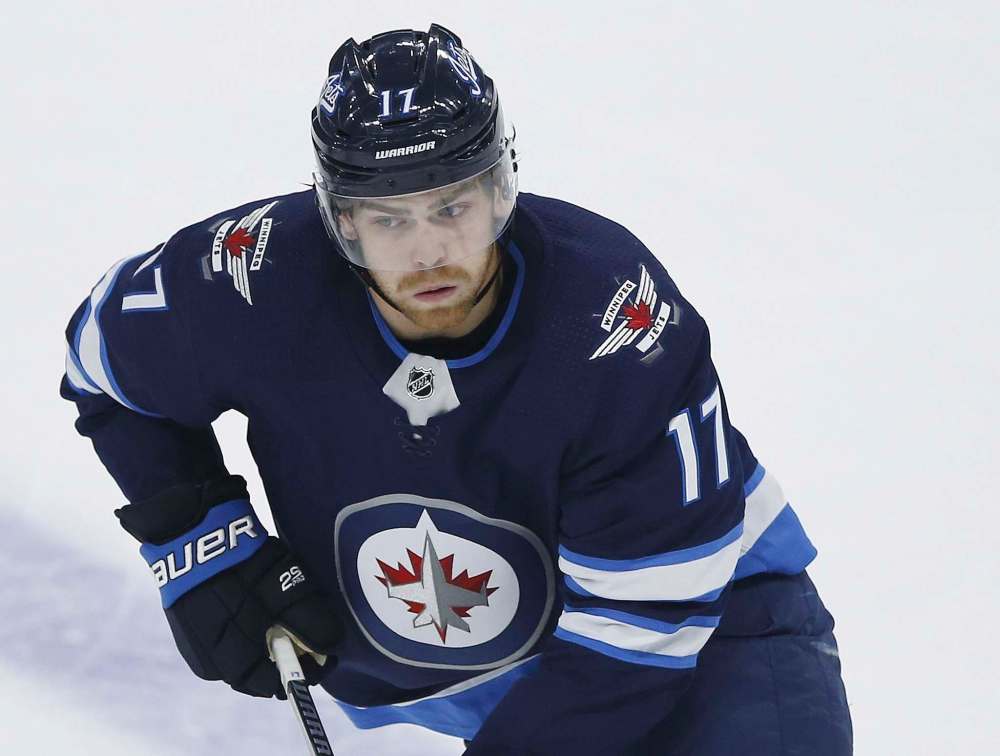 THE CANADIAN PRESS/John Woods
Winnipeg Jets forward Adam Lowry has been suspended two games for boarding Calgary Flames defenceman Oliver Kylington.
