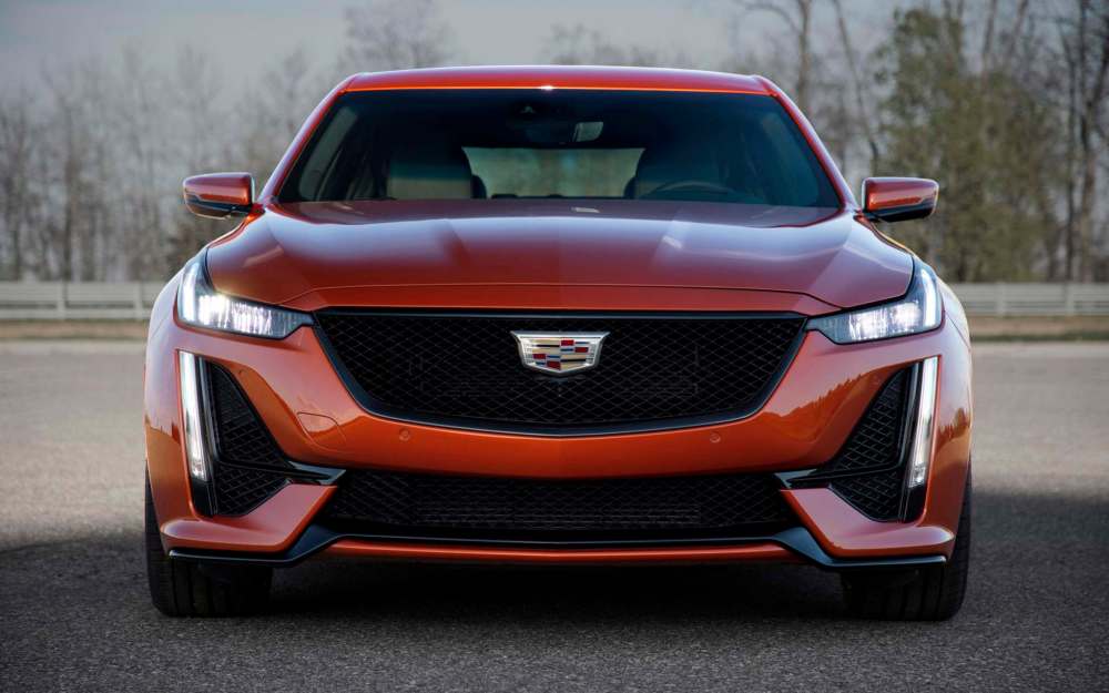 The 2020 CT5 lets everyone know where it came from with a big, multi-coloured crest adorning the middle of the black front grille.