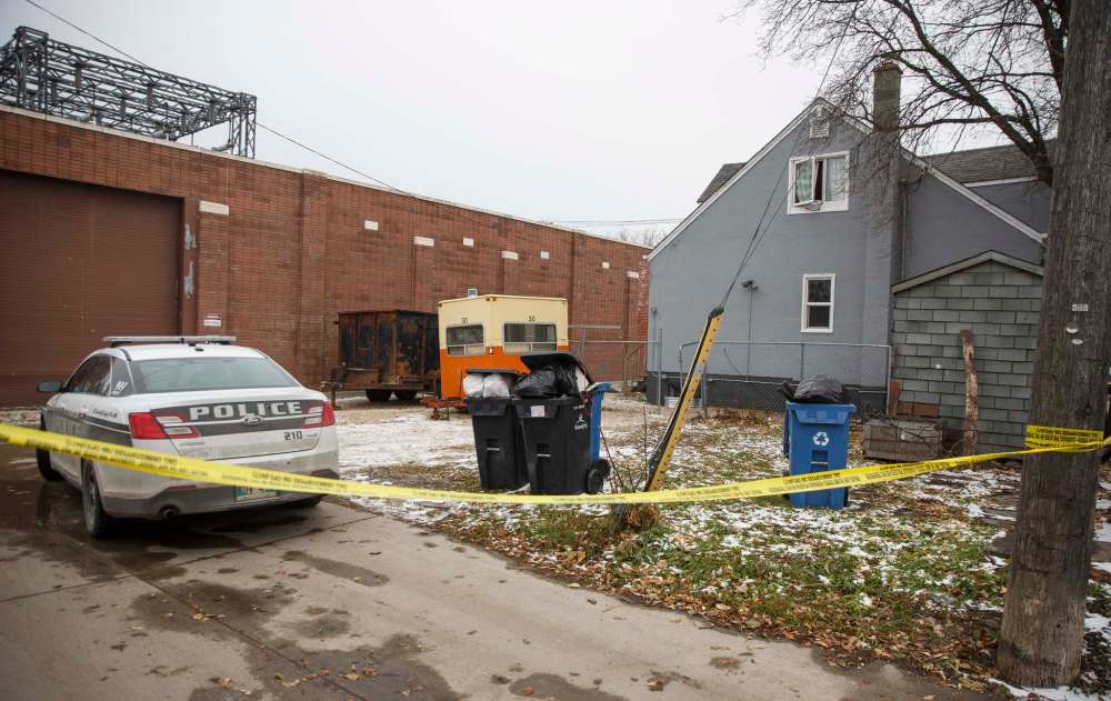 A knife was recovered on Burnell Street, but it remains unclear exactly where the attack happened. (Mike Deal / Winnipeg Free Press)