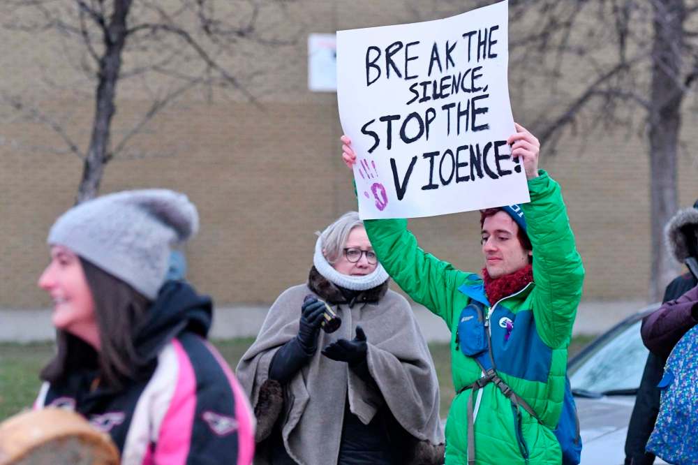 Mike Sudoma / Winnipeg Free Press
Supporters walk down Dufferin Ave in support of the Third Annual End the Silence Stop The Violence down Friday evening to raise awareness about Domestic Violence.
